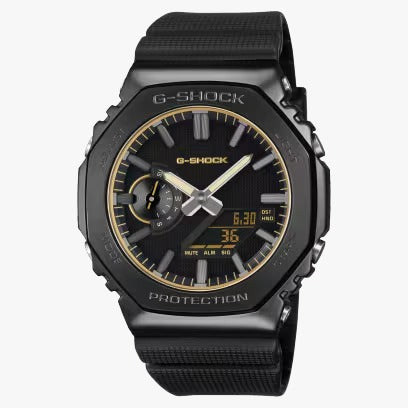 CASIO G-SHOCK GM-2100LXB-1A9 — LUXE BLACK (acentos dorados)